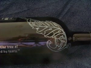 Leaf scroll on wine bottle
